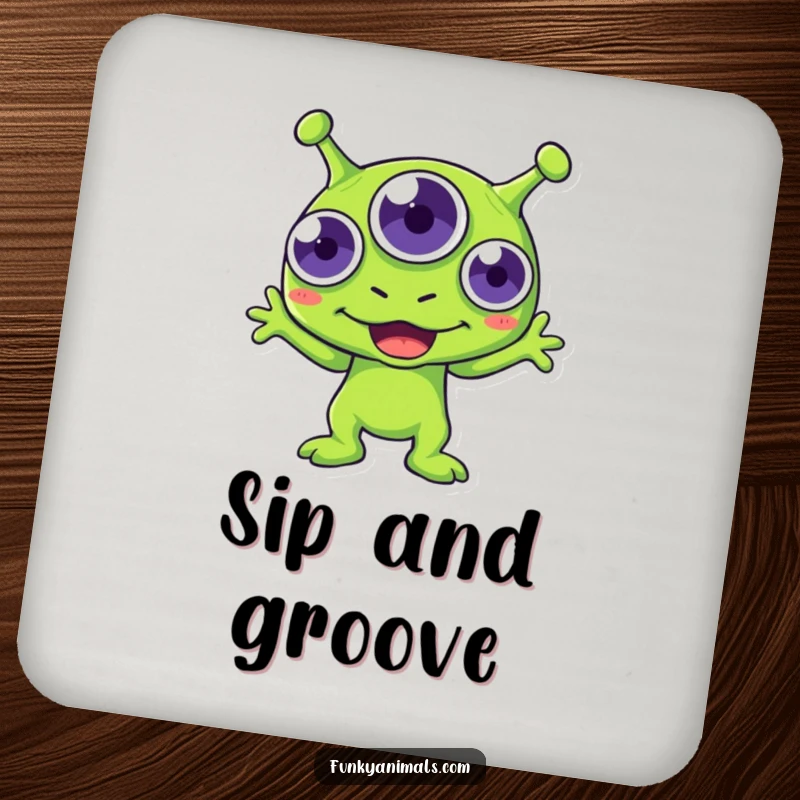Funny green alien drink coaster, three-eyed creature boogying with infectious rhythm, protecting furniture humorously.