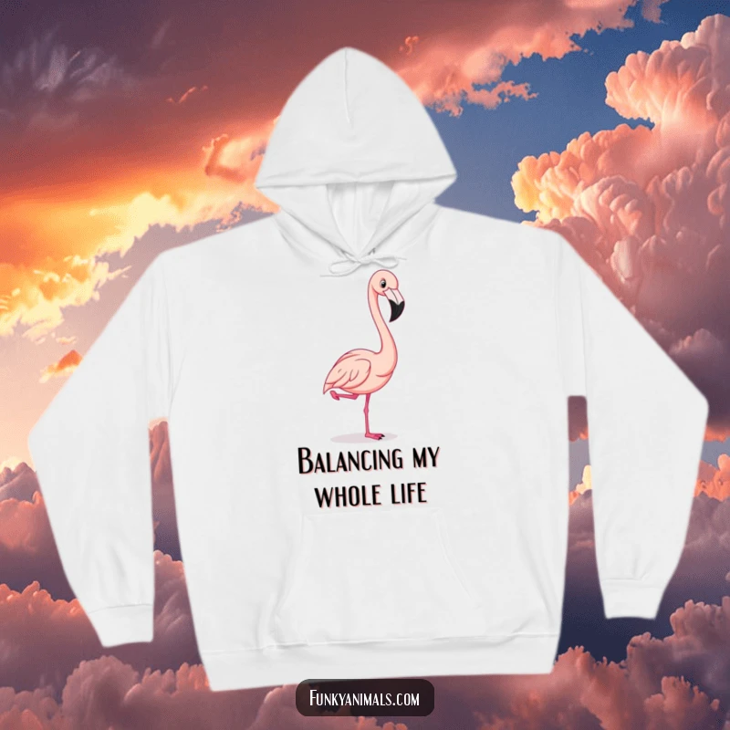 Funny flamingo striking a comical one-legged pose, exuding flamboyant style, a cozy and humorous hoodie.
