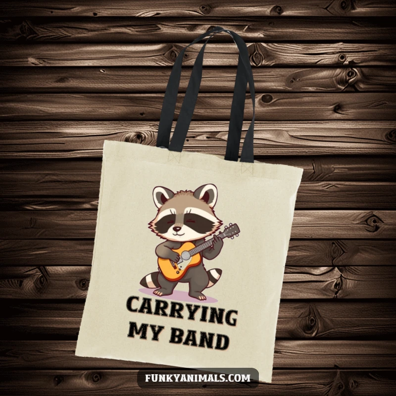 Funny Rocking Raccoon Tote Bag: A cool raccoon cub strumming a tiny guitar, designed for carrying essentials with rockstar energy and humor.