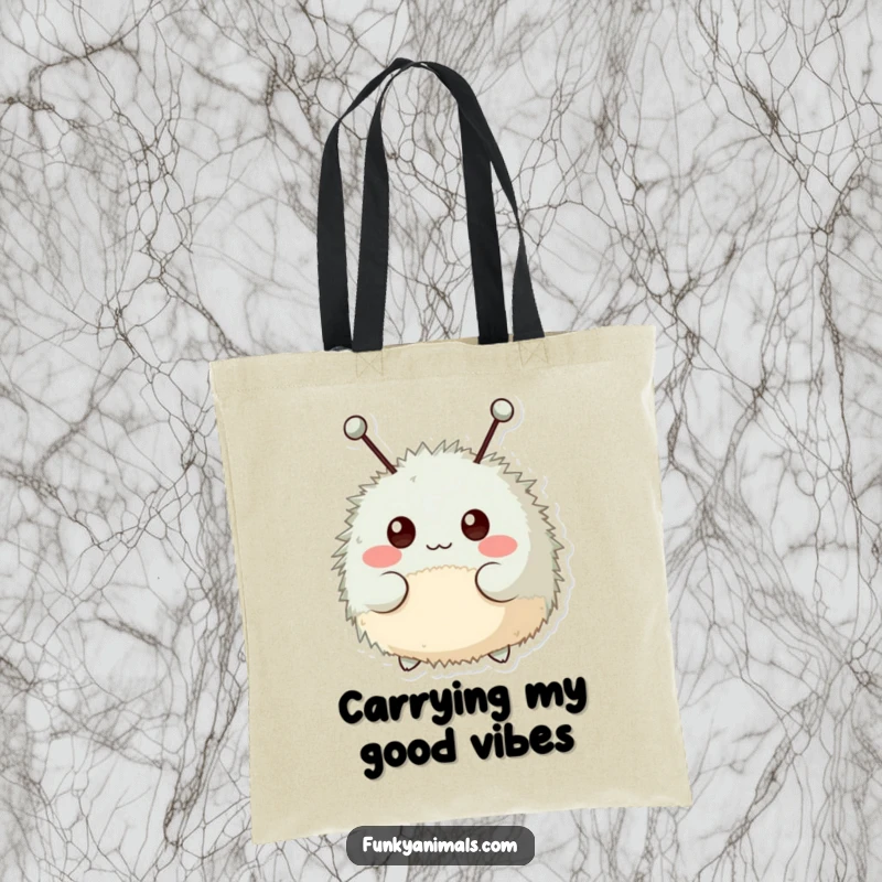 Funny tote bag featuring a fuzzy, round creature with antennae, cheerfully bopping its head to a rhythm.